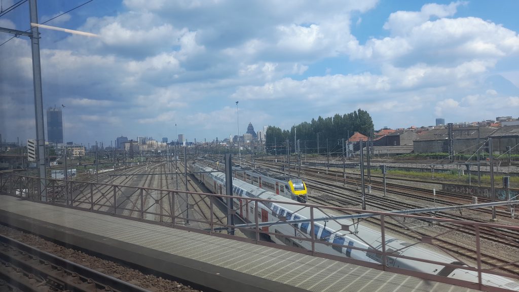 Quick glimpse of the Brussels skyline on the approach to Midi/Zuid station, where you can also see a Belgian double decker set similar to what I was about to ride next